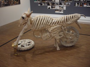 If I was going to name this I'd call it "Motorcycle Skeleton" or "Hey, I lost A Wheel"